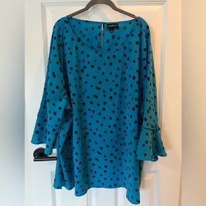 Blue blouse with black dots